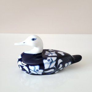 Beautiful porcelain duck figurine.
